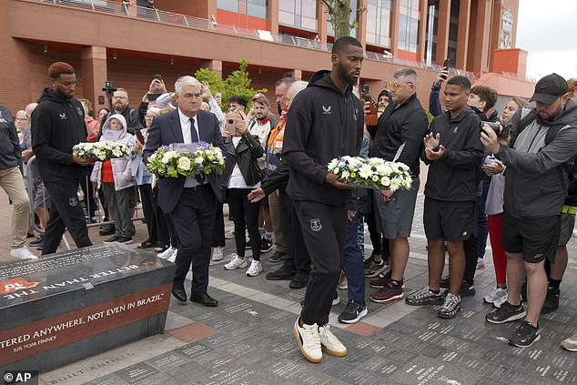 Portuguese-born Everton stars Youssef Chermiti (left) and Beto (right) laid wreaths at Anfield on behalf of the club and paid their respects to Jota