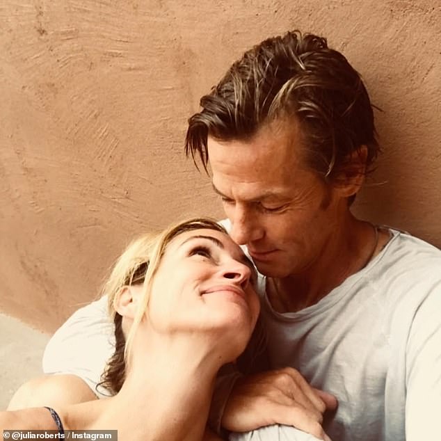 They say money can't buy happiness but Julia and Danny seem to have that in spades and have no need for the flashy display of wealth that other famous couples partake in