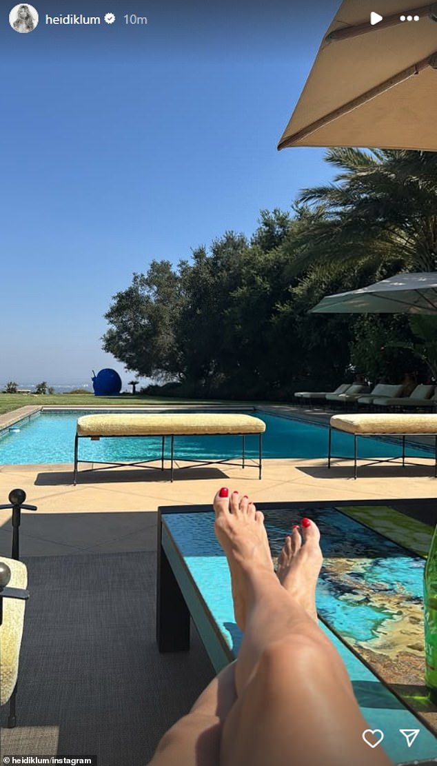 Heidi Klum kicked back by the pool