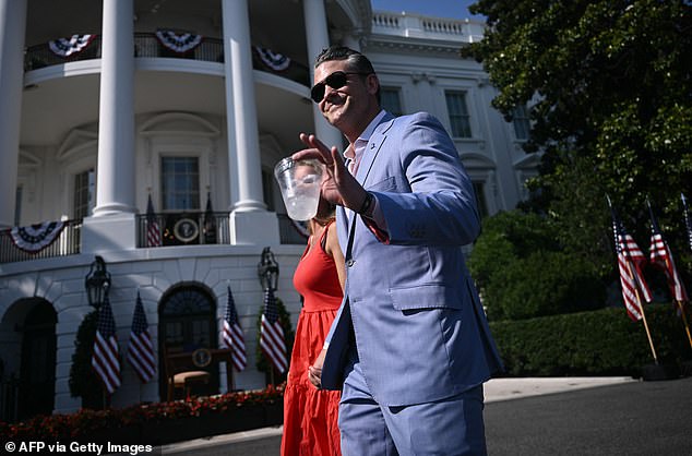 Defense Secretary Pete Hegseth (right) arrives at the White House for the Fourth of July celebration on Friday - which featured flyovers including the B-2 bombers used in the recent bombing campaign of Iran's nuclear sites