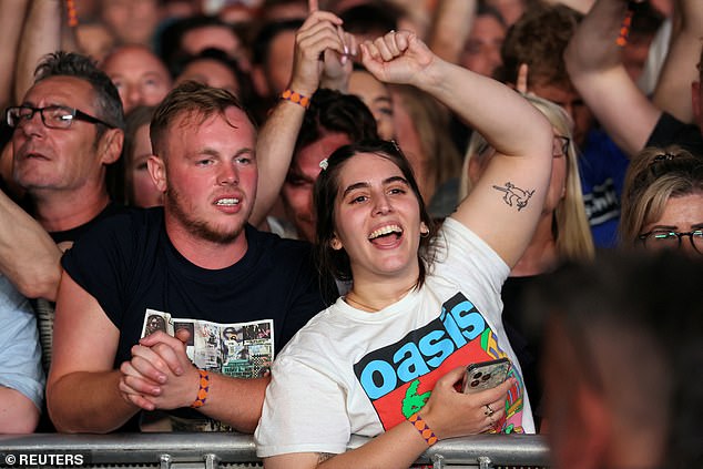 The pair appeared right back home as they stood reunited in front of a crowd of 74,000 people - putting the last 16 years of quarrelling behind them