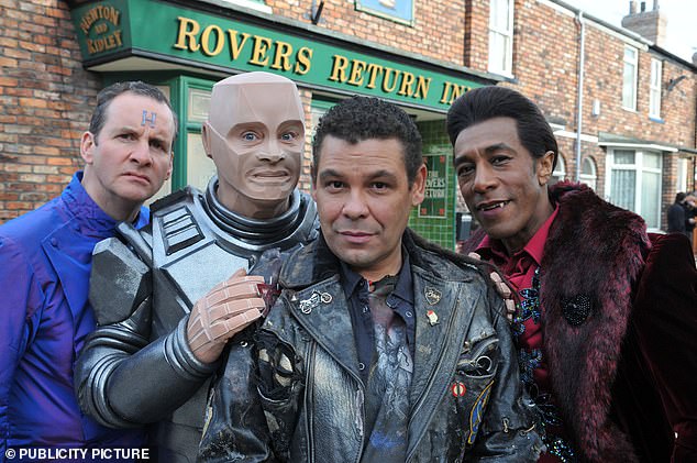 Craig Charles (middle) played Lloyd Mullaney on Coronation Street for 10 years, but left the gig to reunite back with his cast mates (pictured L-R: Chris Barrie, Robert Llewellyn, Craig Charles and Danny John-Jules outside Coronation Street's Rovers Return)