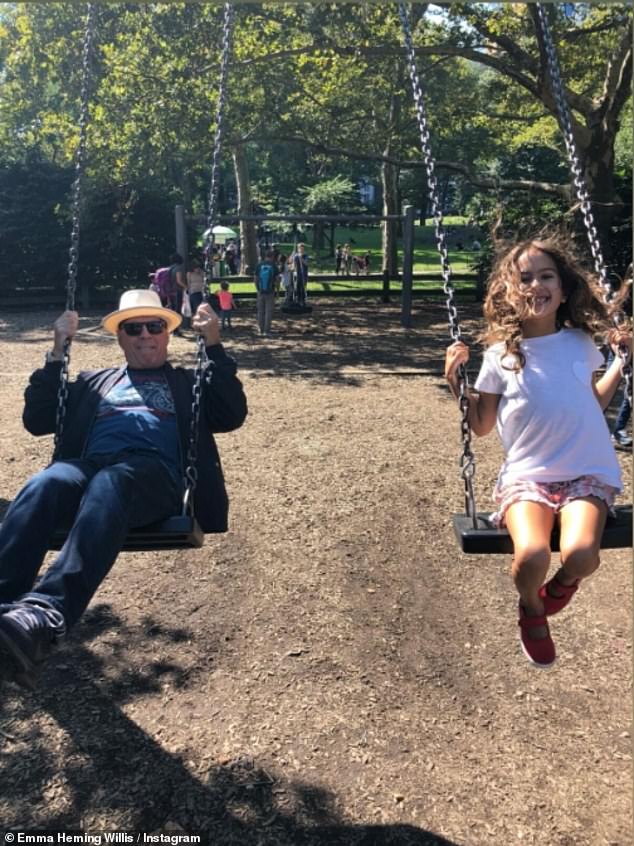 Heming continued: 'What Bruce teaches our girls goes far beyond words. Resilience, unconditional love, and the quiet strength in simply being present. This photo says so much. Love deepens. It adapts. It stays, even when everything else changes'