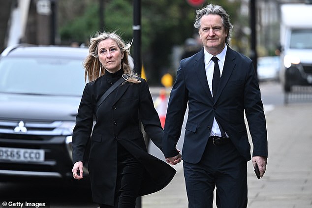 Struggle: Fiona and husband Martin pictured last year as they attended the funeral of Derek Draper
