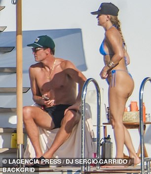 Brady - who was previously married to Gisele Bundchen - also wore a pair of shades and added a gold-chained necklace around his neck