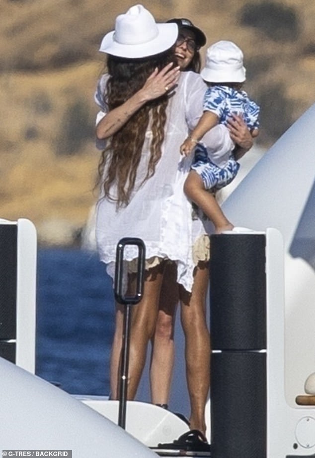 Campbell was also spotted sharing an embrace with Dakota as she made her way onto the yacht