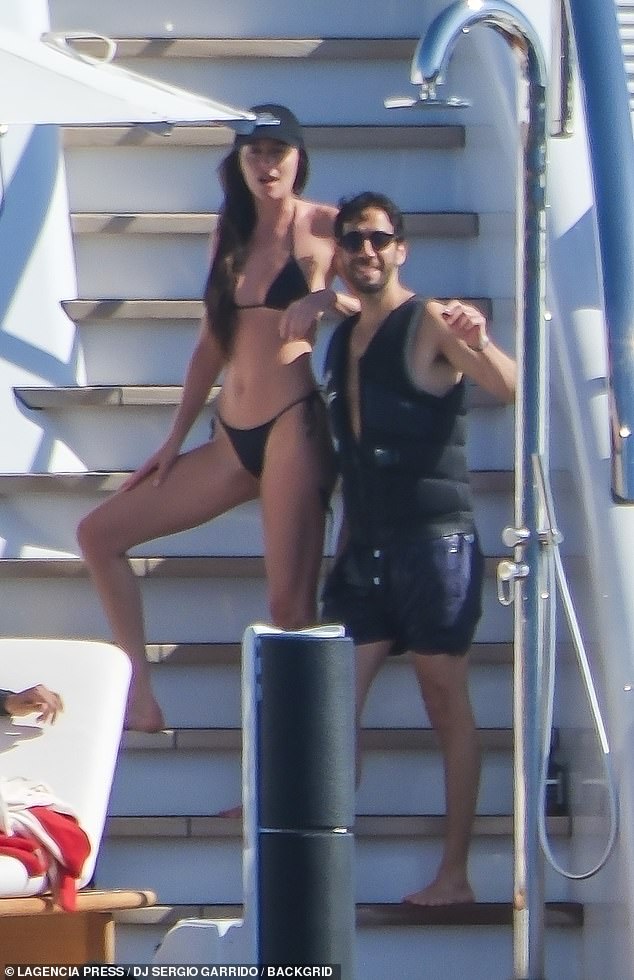 She was also seen leaning on the handsome brunette while enjoying a sun-filled day