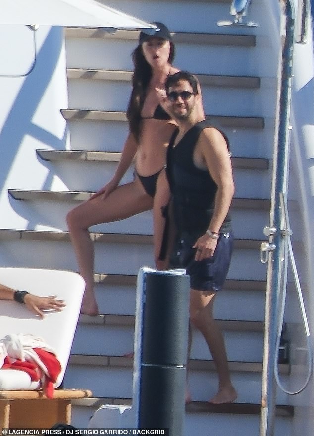 The pair were later spotted spending time at another side of the yacht as the star made her way up a set of stairs