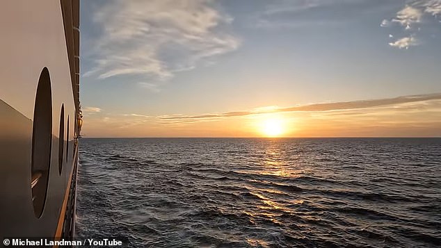 The portholes are open to the sea, as shown here where a passenger stuck their phone out of one to record the outside of the ship and sunset