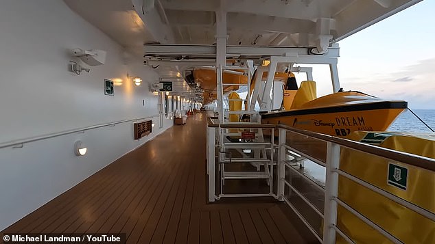 The rescue boat used to bring the father and daughter back to the ship is visible on the right