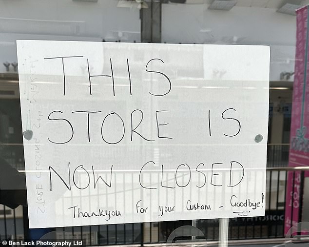 A shop bears a final goodbye to its customers on its frontage