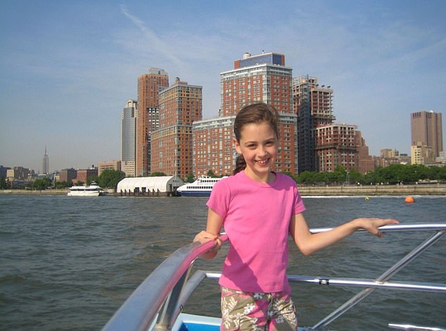 Molly says growing up in New York, close to where the Twin Towers came down, meant she was very aware that she was arriving in Iraq with preconceived notions (Molly pictured on New York's Hudson River as a child)