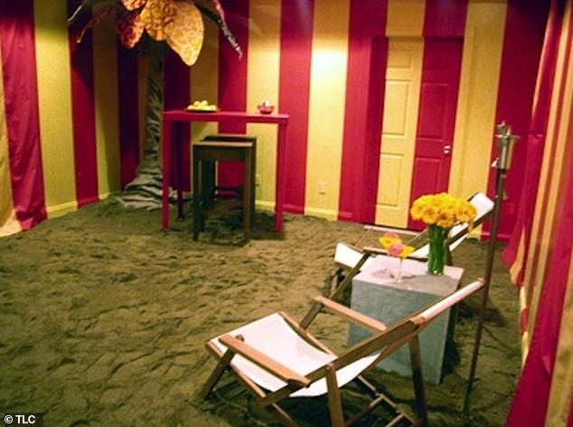 The walls and door had been painted with garish red and yellow stripes and adorned with matching satin curtains