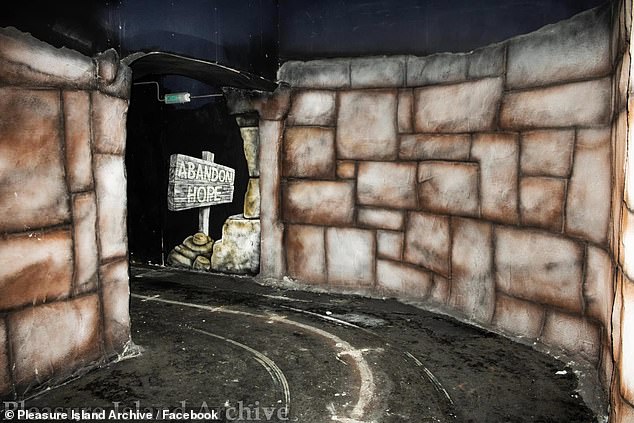 The haunted house staple of a sign reading 'Abandon Hope' is also seen in pictures