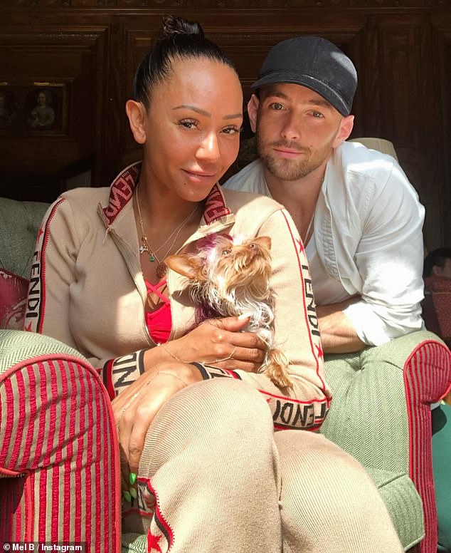 Yet Victoria still had Mel, 50, on her mind as she took to Instagram to share a sweet black and white throwback of the pair with bandmates (Mel B and Rory pictured together)