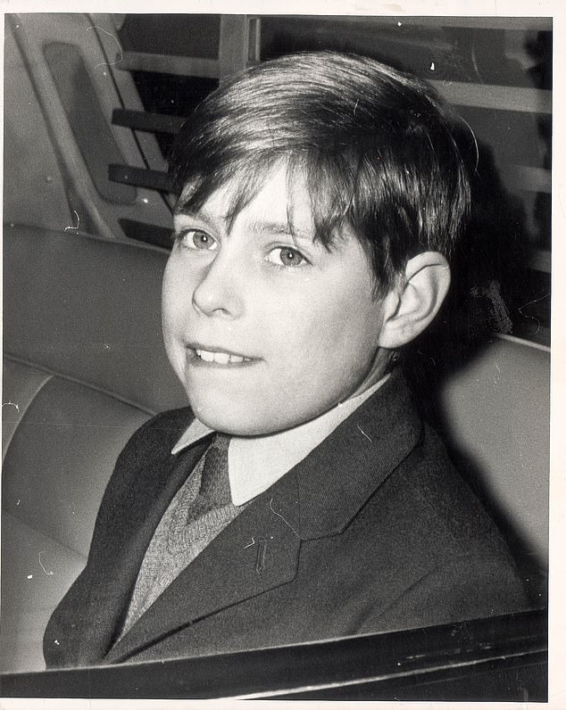Andrew smiles while being driven from Heatherdown to Buckingham Palace to celebrate his 11th birthday in February 1971