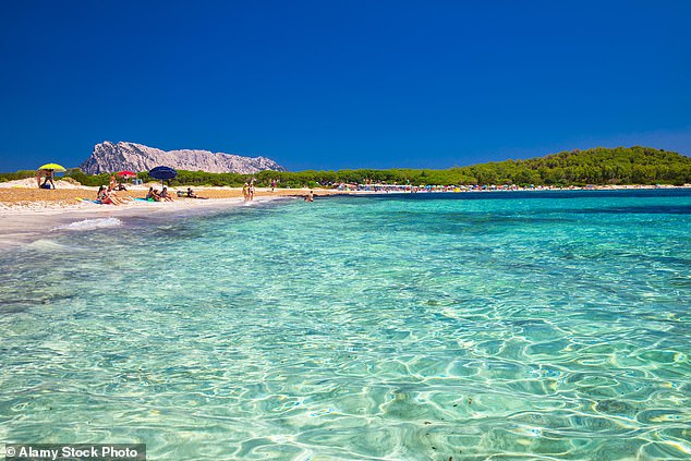 The shallow turquoise waters at Spiaggia di Lu Impostu in Sardinia