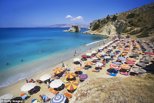 The small horseshoe beach at Pasqyra in Albania