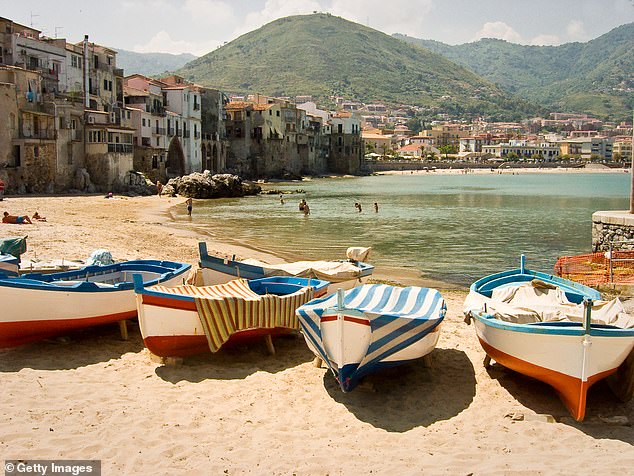 The small town of Cefalu in Sicily which is home to medieval bathhouses, a tangle of ancient lanes and a UNESCO-listed cathedral