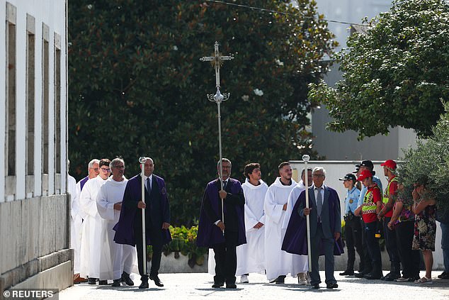 People take part in a funeral procession of Portuguese footballers and brothers Diogo Jota and Andre Silva in Gondomar