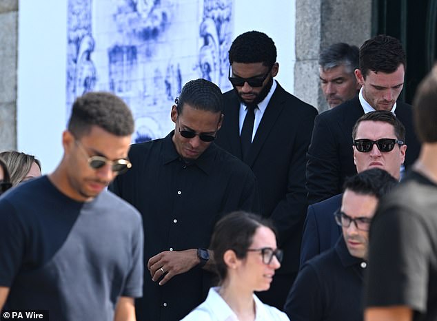 Liverpool's captain Virgil van Dijk, defender Joe Gomez and defender Andy Robertson leave the Igreja Matriz de Gondomar following Jota and Andre's funeral service
