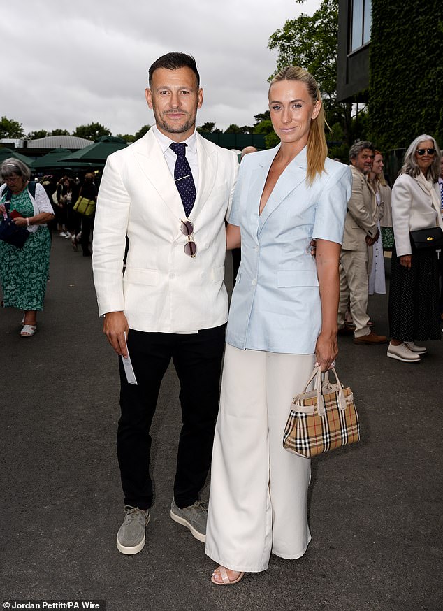 Danny and Jody Care posed for a photo outside