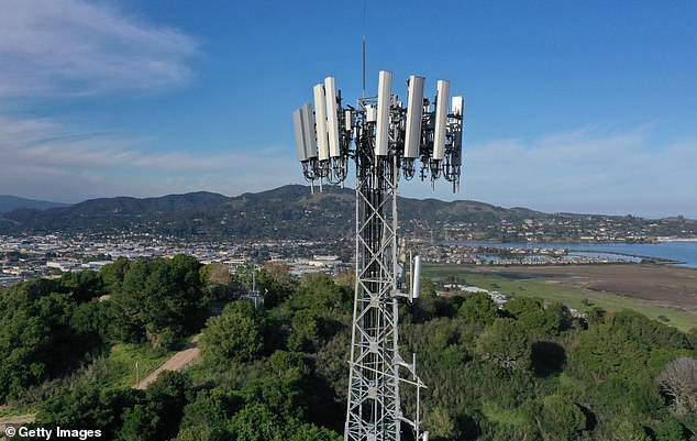 An aerial view of a cellular tower stands on the top of a hill in Larkspur, California