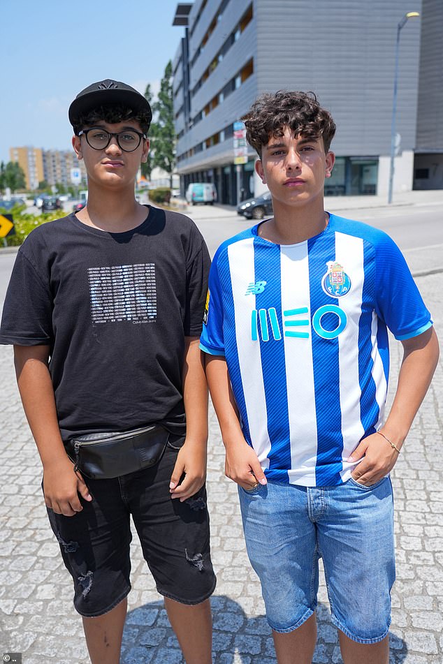 Porto fan Martim Fonseca and his brother Felix. Martim said it was 'a surprise' they didn't see Ronaldo attend the funeral