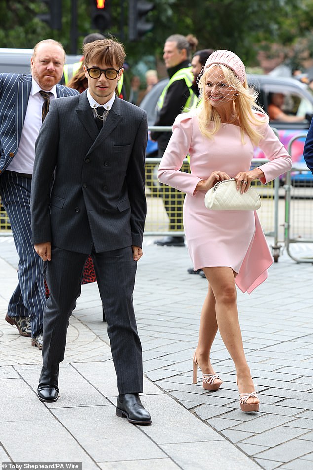 Emma Bunton, the only other Spice Girl in attendance - led the celebrity guests arriving for the wedding as Scary Spice prepared to walk down the aisle for the third time