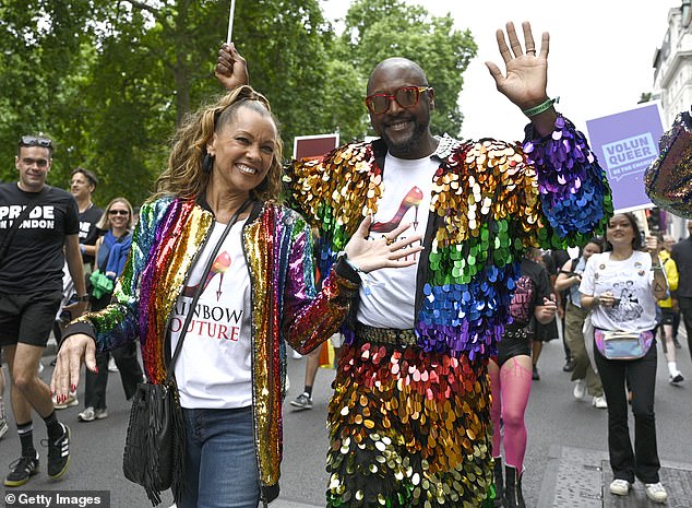 The pair were pictured taking part in the parade, which is one of the largest in the world and headlined by US singer Chaka Khan (Vanessa pictured with Matt Henry)