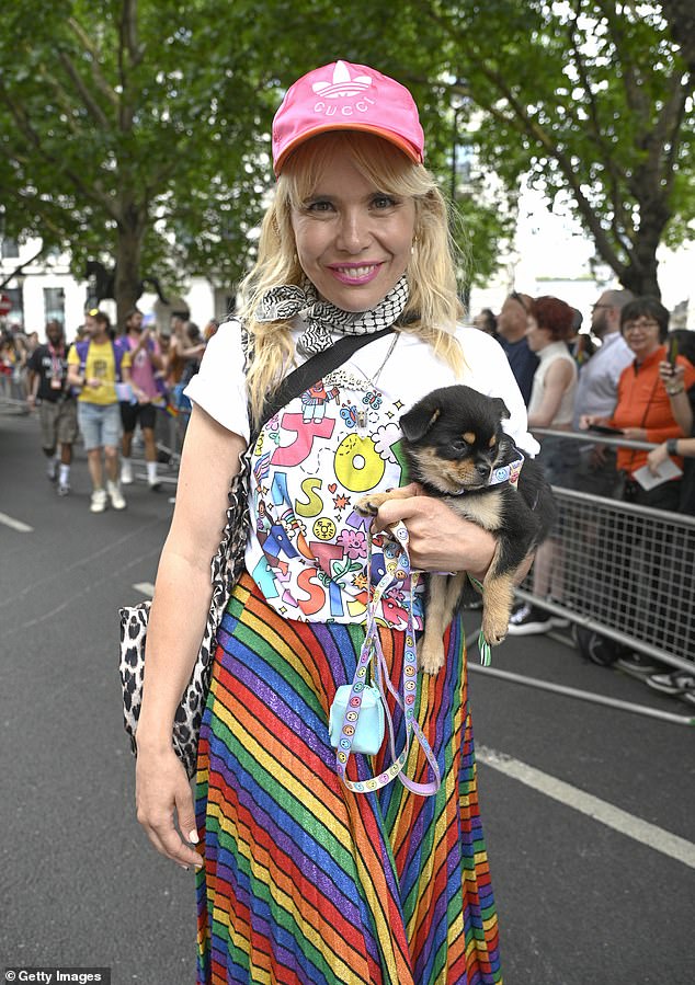 Paloma Faith was pictured with her adorable dog as she donned a rainbow-coloured skirt with a white, printed t-shirt