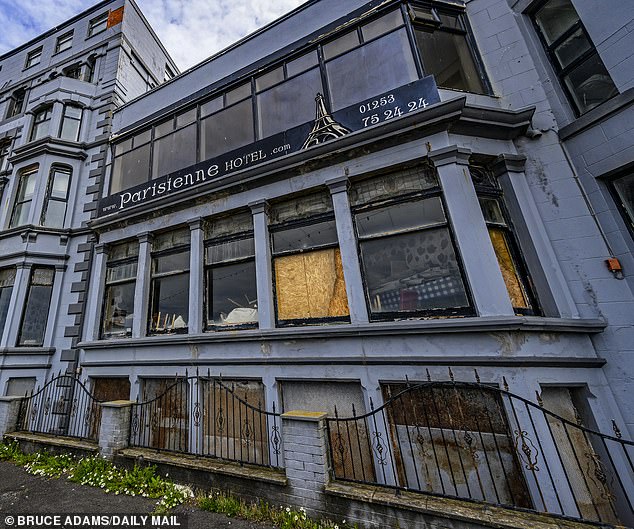At the Parisienne Hotel, also on the Promenade, windows are boarded up and rotting mattresses can be seen through the windows