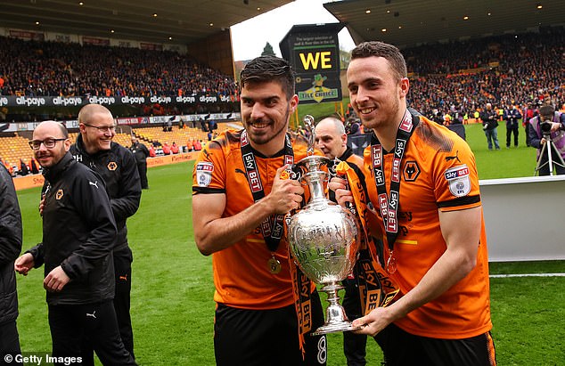 Jota scored 44 goals across three seasons with the Molineux club, winning the Championship title and reaching the quarter-finals of the Europa League (pictured with Ruben Neves)