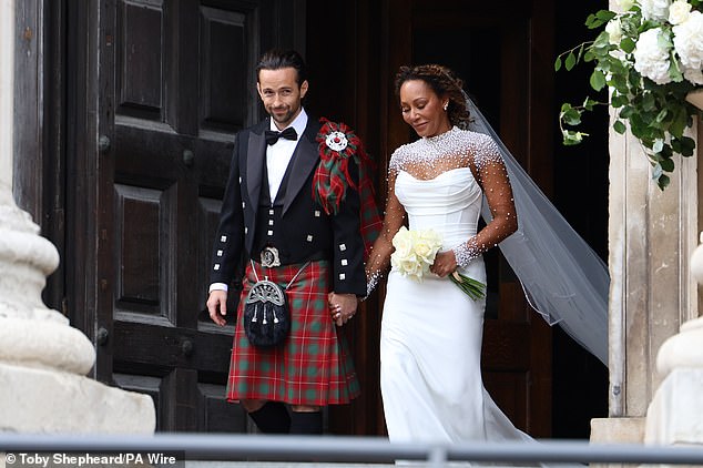 Groom Rory, 37, opted for traditional Scottish attire complete with a red and green tartan kilt for the nuptials
