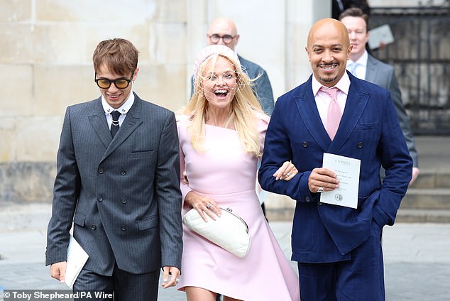 Emma couldn't stop smiling as she was snapped leaving the ceremony, looking very proud for her friend