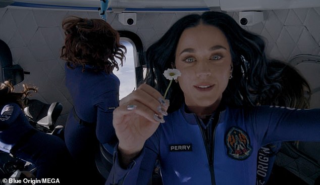 Katy, pictured on board Jeff Bezos' all-female Blue Orbit suborbital flight in April, may have been to space, but she's going to have to brace yourself for this re-entry.