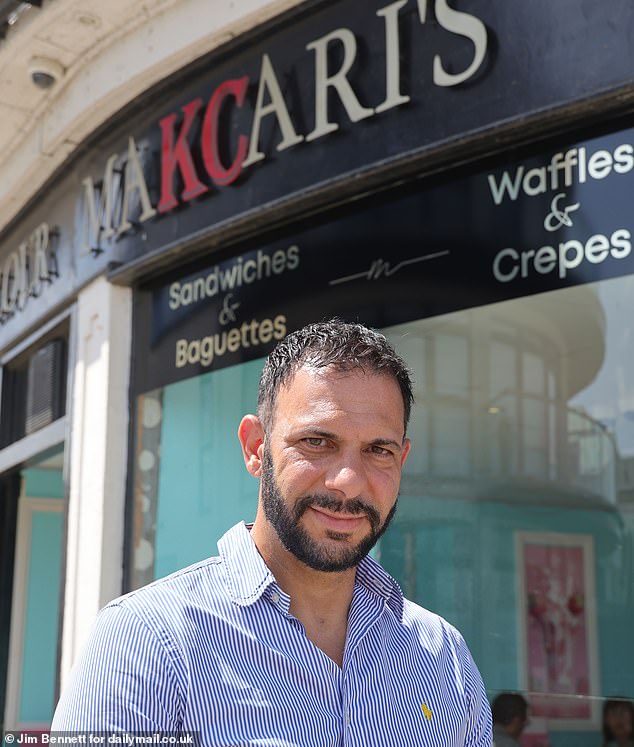 Cafe owner Mitch Nejni said the town was under seige by the 'plastic gangsters'