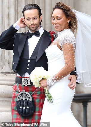 Mel was holding back tears as the newlyweds shared a tender moment together