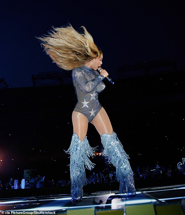 For her first of two nights in the city, right outside of Washington, DC , she painted the stage red, white and blue and strutted around in a fur coat with the imagery of the American flag