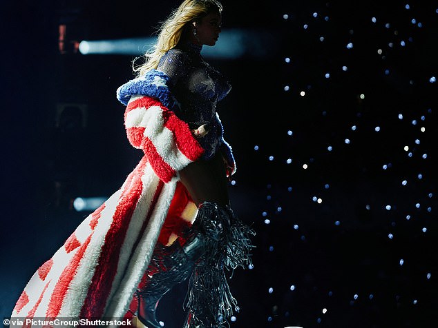 For most of her show, she rocked a sheer, blue bodysuit with long-sleeves and a bullet bra-inspired silhouette with silver stars on the bust