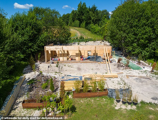 The demolition of the cabin is now firmly under way and the land will be returned to its former state
