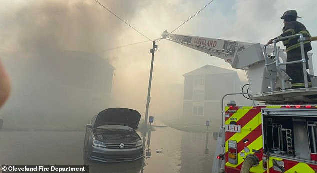 Firefighters battle the blaze after the explosion. The cause of the blast is being investigated