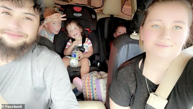 Ryan's fiancée, Christinia Wilson (pictured with family), said the water surged into their home so quickly that it reached knee-level in just 20 minutes