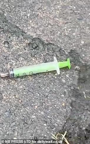 A syringe left discarded by addicts outside businesses in Rawson Square, Bradford