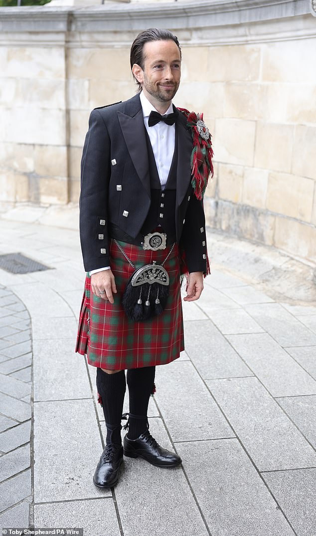 Groom Rory flashed a nervous smile as he arrived for his big day