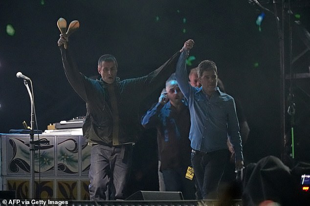 Kicking off the show, Liam and Noel walked out with their arms around each other in a sweet display of unity, before they proudly gazed on at the crowds, who erupted into rounds of deafening applause
