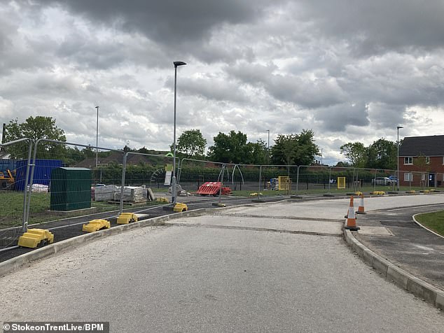 Pictured: The unfinished fenced off play area on the Hollington Grange estate in Fegg Hayes