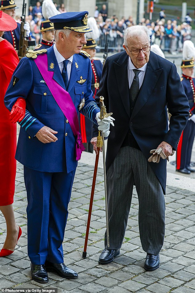 Albert (right), 91, is pictured with his son King Philippe of Belgium, 65, who became monarch in 2013