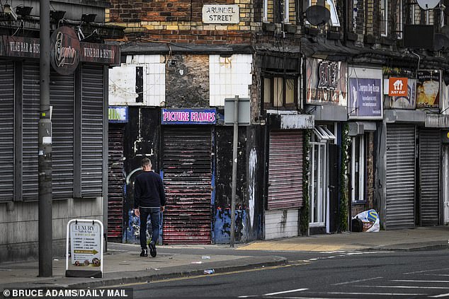 Shops up and down the high road in Walton were left empty, with shutters pulled down and buildings crumbling