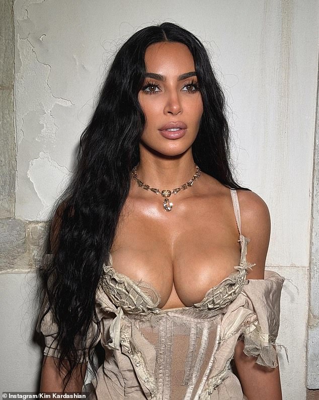 Khloé's older sister Kim,43, has confessed to very few nip tucks. Pictured here in June